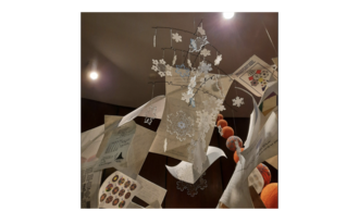 Koch snowflakes descend through the Cavalcade of mathematical pages onto Integral Hill in the exhibit