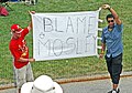 Disgruntled fans with a "Blame Mosley" banner during the race at the United States GP 2005.