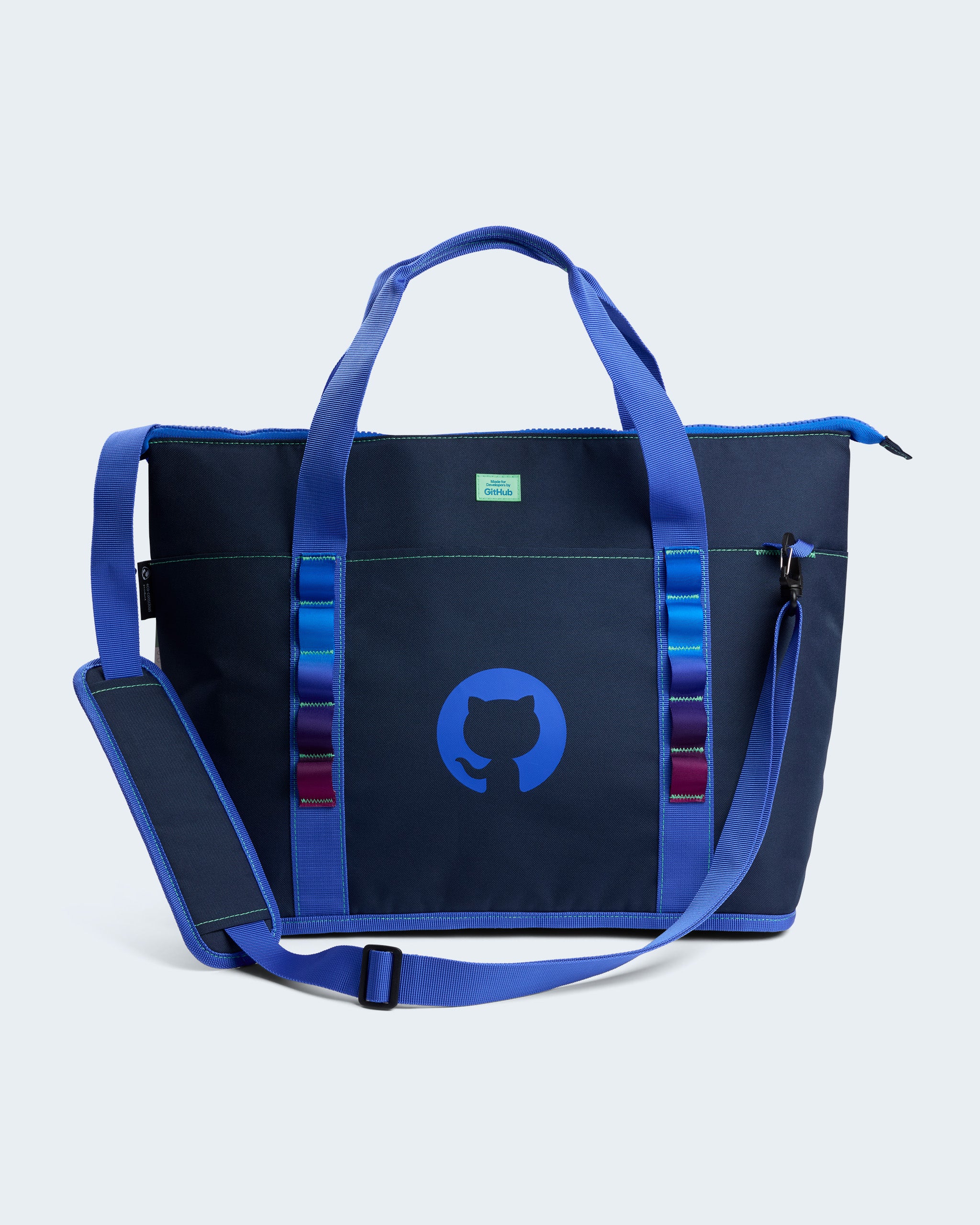Navy Cooler Tote  with a navy invertocat logo on the front. Top grab handle and adjustable, padded shoulder strap for dual carry options